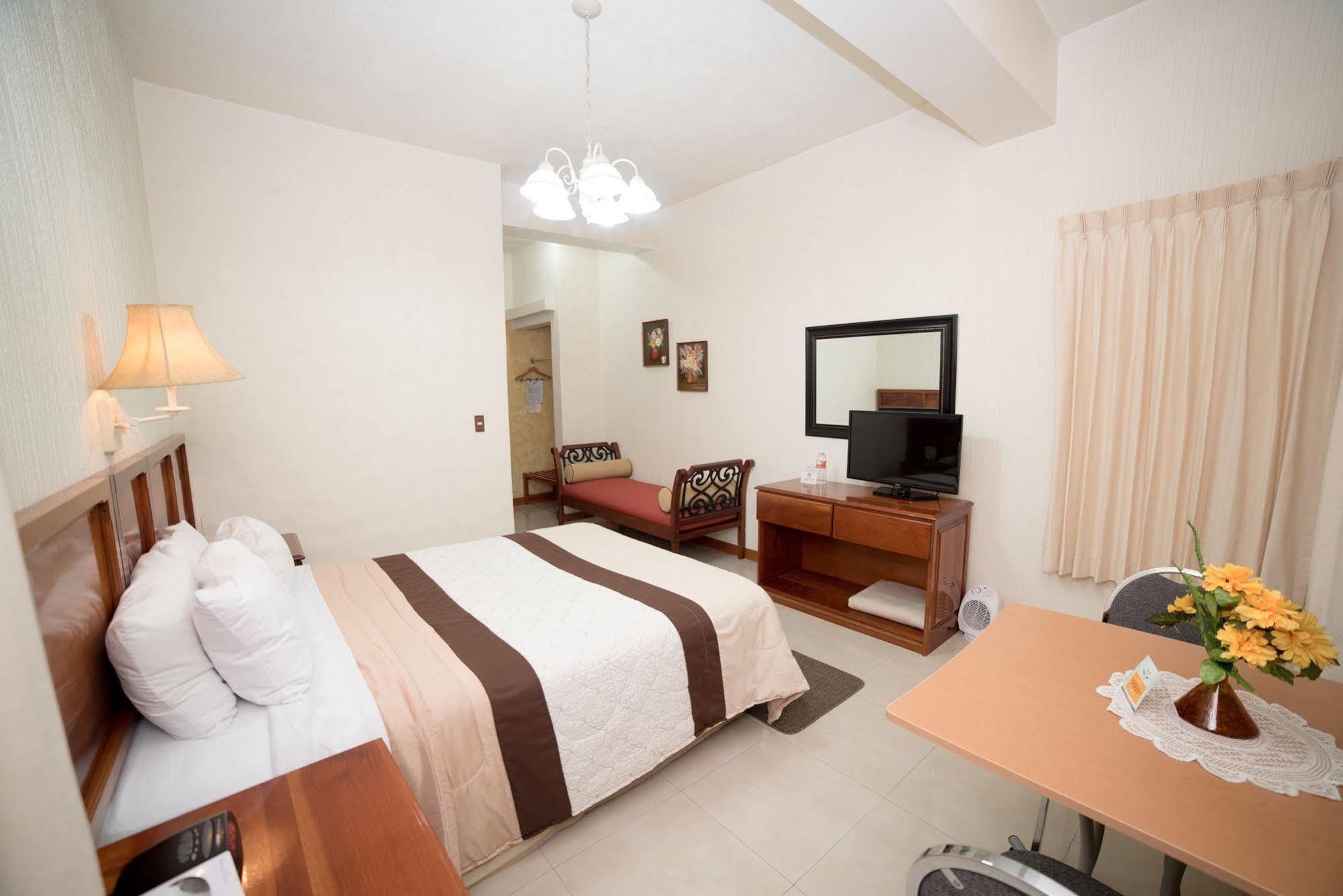 Hotel Anna Inn Olintepeque Bagian luar foto