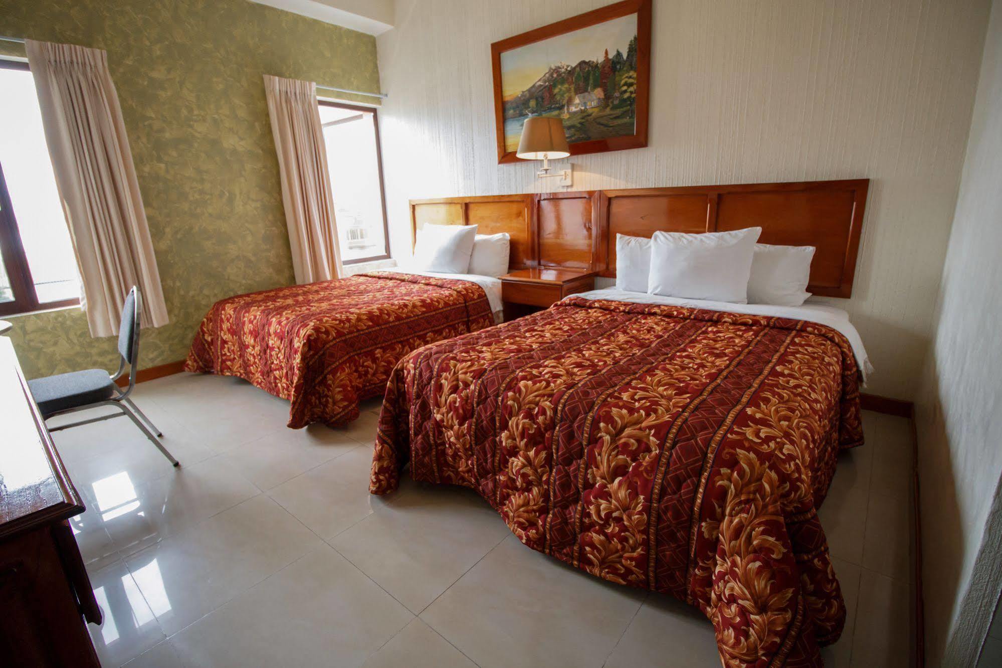 Hotel Anna Inn Olintepeque Bagian luar foto